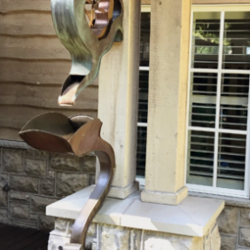 copper bronze gutter art