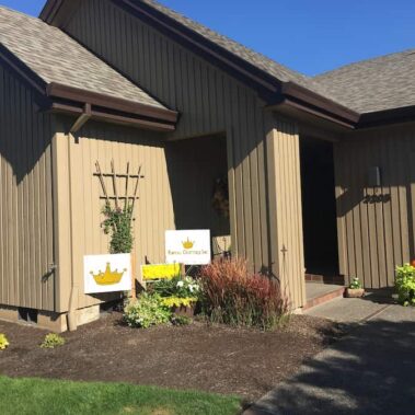 Brown box-style gutters perfectly matched to Craftsman home trim, showcasing seamless integration with architectural design and landscaping