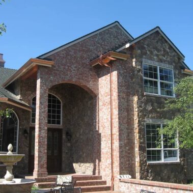 Luxury Portland home with custom copper K-Style gutters by Royal Gutters - seamless integration, expert installation. Call 503-558-8700