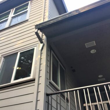 Royal Gutters' professional fascia gutter installation with square downspout. Modern design for Portland homes. Expert service: 503-558-8700