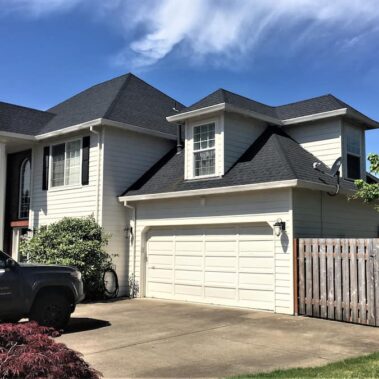 Royal Gutters' premium white fascia gutter system on Portland luxury home. Complete protection for modern architecture. 503-558-8700