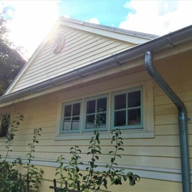 Royal Gutters' galvanized round downspout system - classic style with superior drainage for Portland homes. Call 503-558-8700