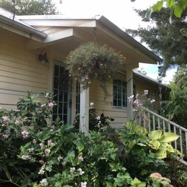Royal Gutters' galvanized half-round gutters enhance charming Portland cottage with traditional styling. Professional installation: 503-558-8700