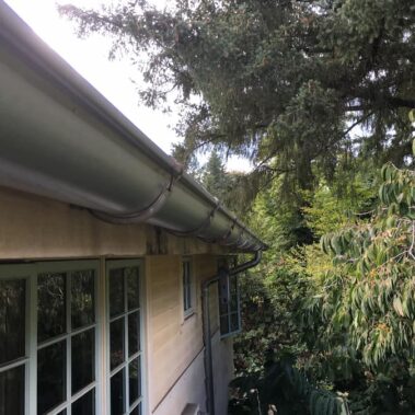 Royal Gutters' galvanized half-round gutters with external brackets showcase - premium Portland installation. Call 503-558-8700