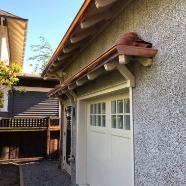 Royal Gutters' premium half-round copper gutters with concealed bracket system - elegant Portland installation. Call 503-558-8700