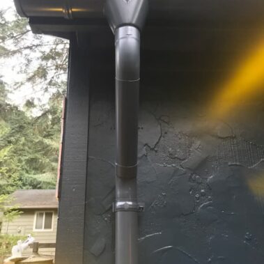 Royal Gutters' premium black downspout with designer collector head - expert Portland installation. Call 503-558-8700