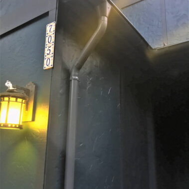 Royal Gutters' round downspout with Max Flow outlet technology - superior water management for Portland homes. Call 503-558-8700