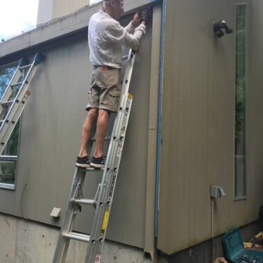 Royal Gutters Portland team executing custom commercial gutter installation. Professional commercial solutions. Call 503-558-8700