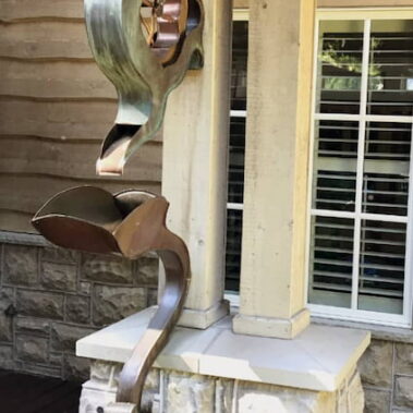 Royal Gutters Portland artistic downspout - sculptural copper and silver design for luxury homes, professional installation