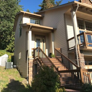 Royal Gutters' square downspout system expertly installed on multi-level Portland home. Perfect for complex architecture. 503-558-8700