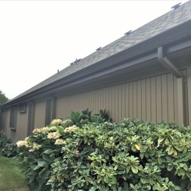 Royal Gutters' smooth square downspout seamlessly connected to fascia gutter. Expert Portland installation. Call 503-558-8700