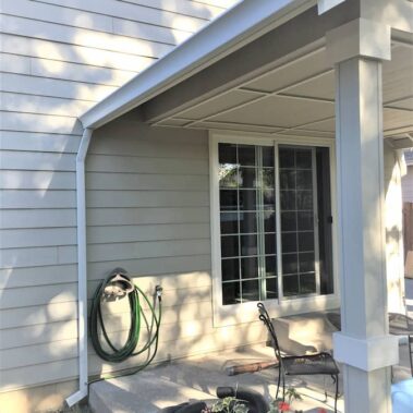 Royal Gutters' Spanish curved gutter system with integrated square downspout - elegant design meets superior drainage. Portland experts: 503-558-8700