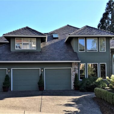 Spanish curved white gutters by Royal Gutters enhance luxury Portland home. Premium installation, seamless design. Call 503-558-8700