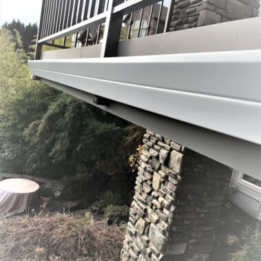 Royal Gutters' wide-bottom deck gutter system with premium fascia design. Specialized Portland patio protection. Free estimate: 503-558-8700