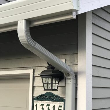 Royal Gutters' premium white fascia gutter system with precision downspout installation. Expert Portland craftsmanship. Call 503-558-8700