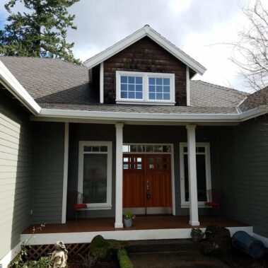 Royal Gutters' white fascia gutter system with square downspout, expertly installed on Portland craftsman home. Free estimate: 503-558-8700